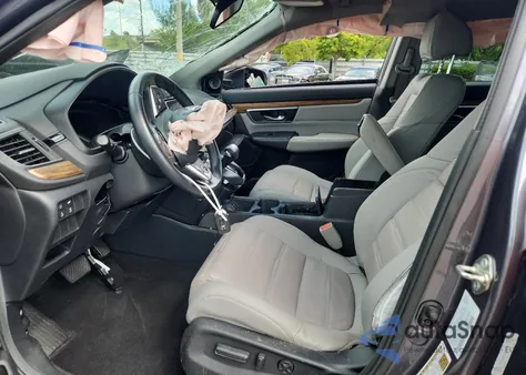 2017 Honda Cr-V Touring z USA, uszkodzony, nr VIN 5J6RW1H97HL016859